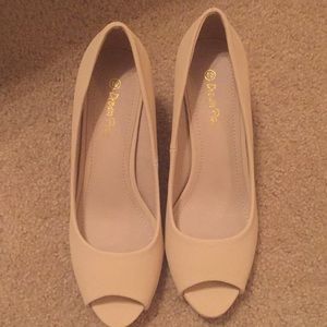 Nude open toed heels